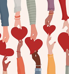 Hands holding onto hearts signifying unity