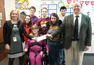 Students and teacher receive a grant check from our Assistant Superintendent, Dr. Sean Wolfrom.