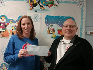 Chasidy Gornati (pictured on the left) was recently presented with a PARSS grant check by Superintendent Dr. Brian Toth at South St. Mary's Street Elementary School.
