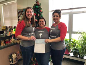 Teachers of the Octorara display their check from PARSS.