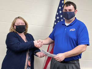 Forest Area presentation of the grant check. Amanda Hetrick is on the left, and Luke Alex is on the right.