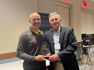 PARSS Executive Director, Dr. Edward Albert, presents the PARSS Advocacy Award to Mr. Matthew Splain, Superintendent of the Otto-Eldred School District