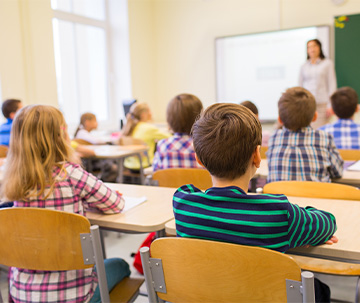 students in a classroom listening