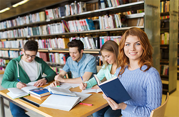 Students in a library studying