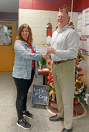 Left to right: Melissa Tewksbury and Mr. William J. Clark, superintendent