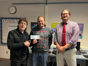Tim Bainey (board president), Tyler Good (teacher), Brian Pelka (Osceola Mills Elementary principal)