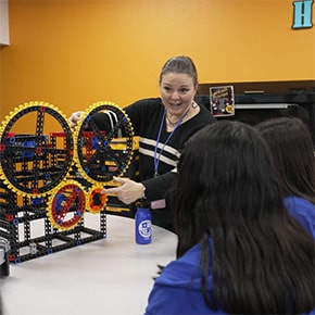 teacher showing how a gears stem project works