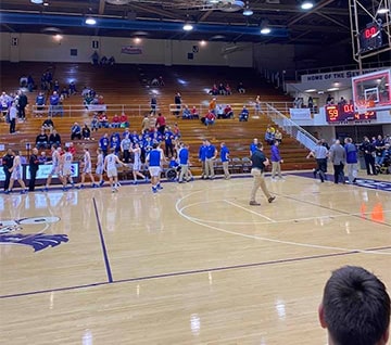 People gathered at basketball game