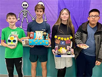 Students with shoebox art