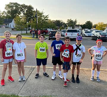 Students with racing bibs on