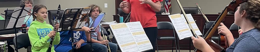 students learning music