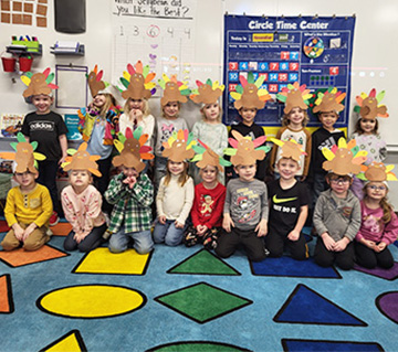 Students posing for a Thanksgiving picture
