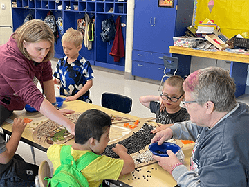 Teachers and students working together