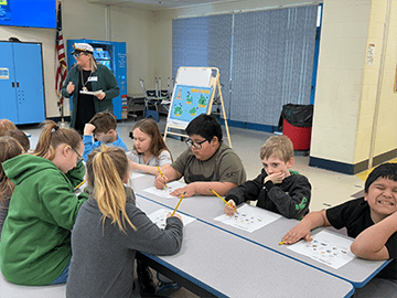 Students working at a table together