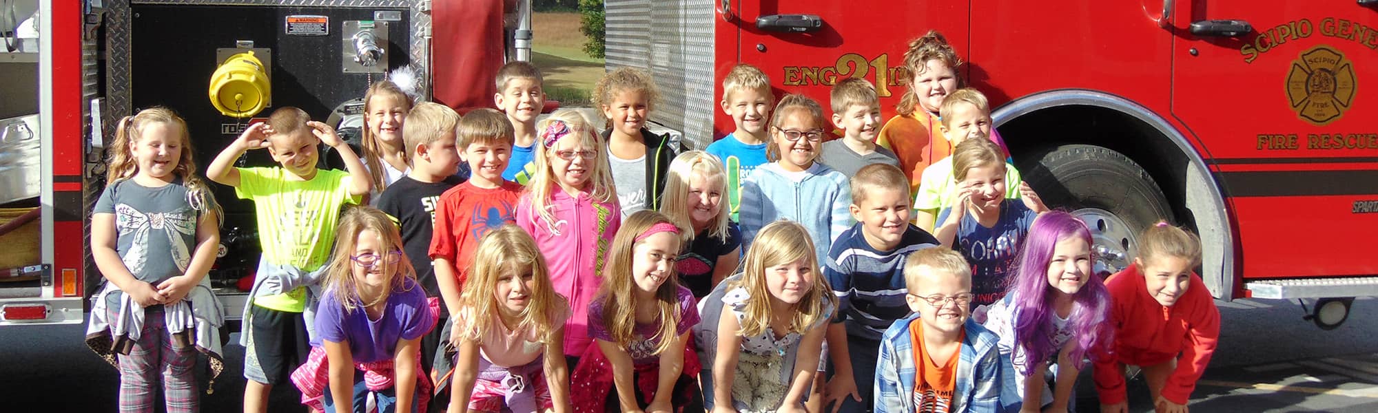 Students in front of a fire truck