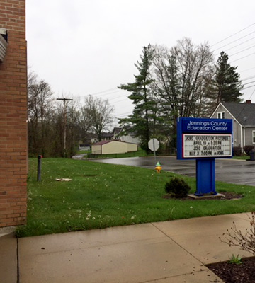 Outside view of school welcome sign