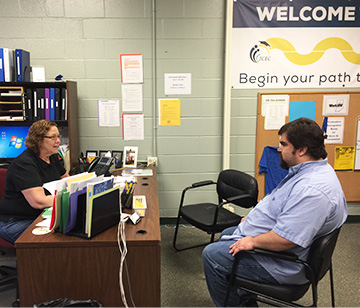 Counselor meeting with an student