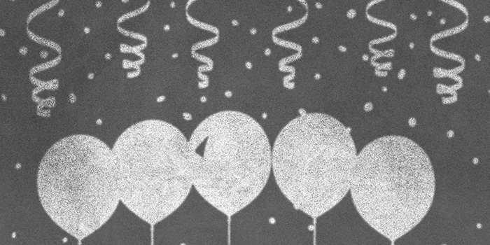 Party balloons drawn on a chalkboard