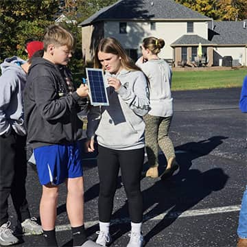 Two students talking outside