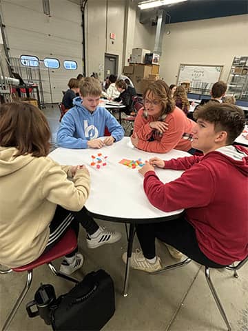 Students working at a table together
