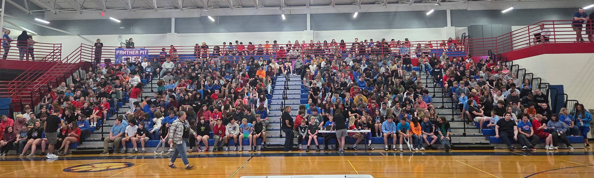 Entire student body sitting in bleachers