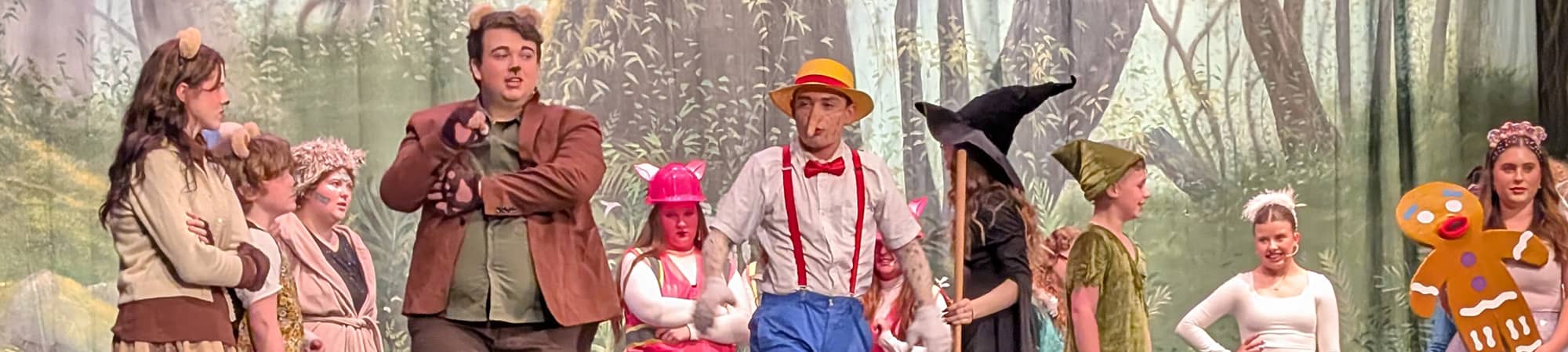 students performing a play