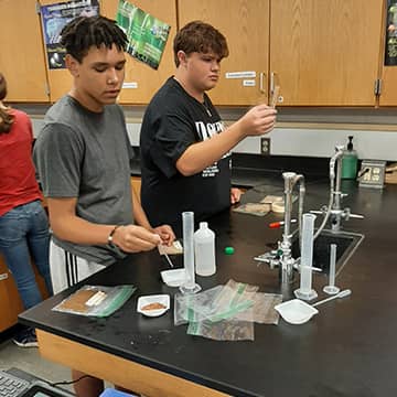 students doing a lab experiment
