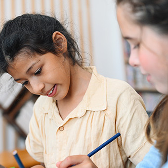 Two female students working together