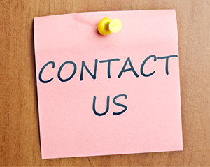Contact Us written on a sticky note