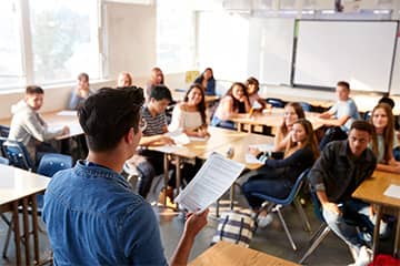 Students listening to their teacher