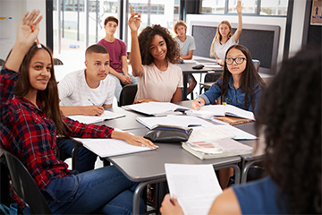 Students listening to their teacher