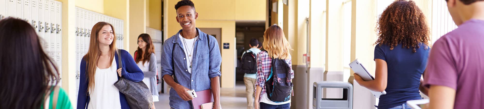 Students walking through hallways