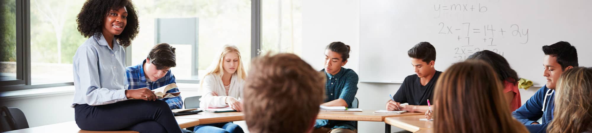 Students listening to their teacher