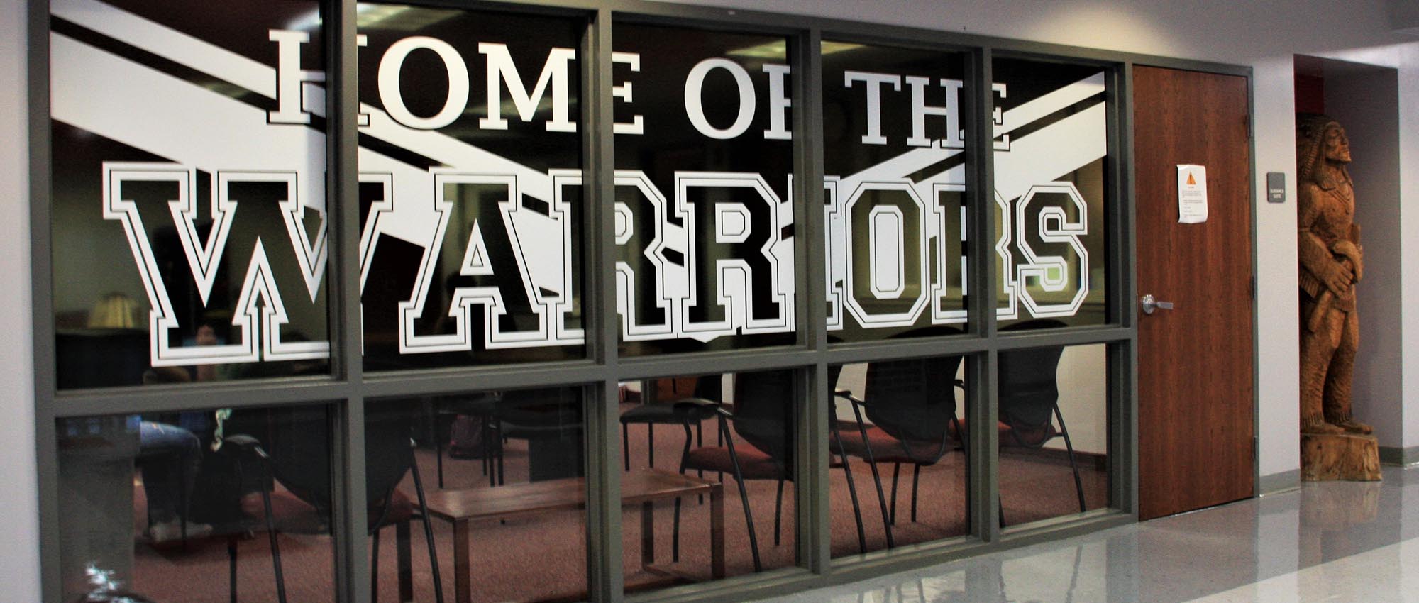 Home of the Warriors mural inside the school building