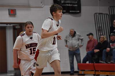 boy in white running