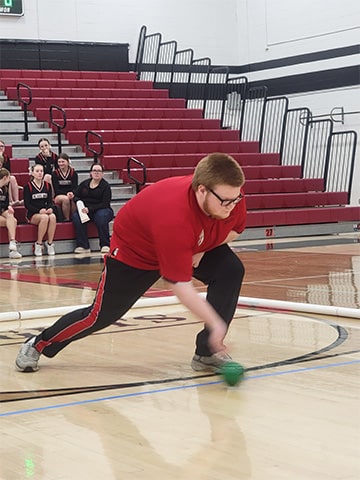 Student playing shuffle ball