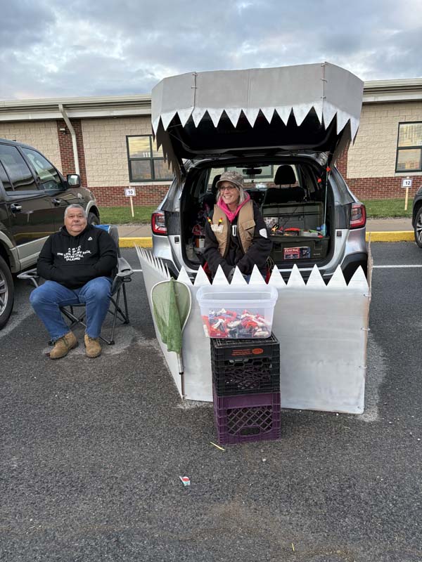 TrunkOrTreat Two People By Monster Trunk Display