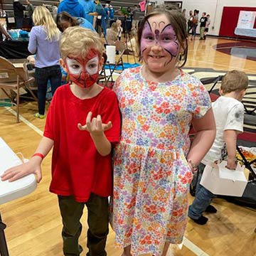Two students with face paint