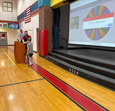 Student receiving Warrior Wins award