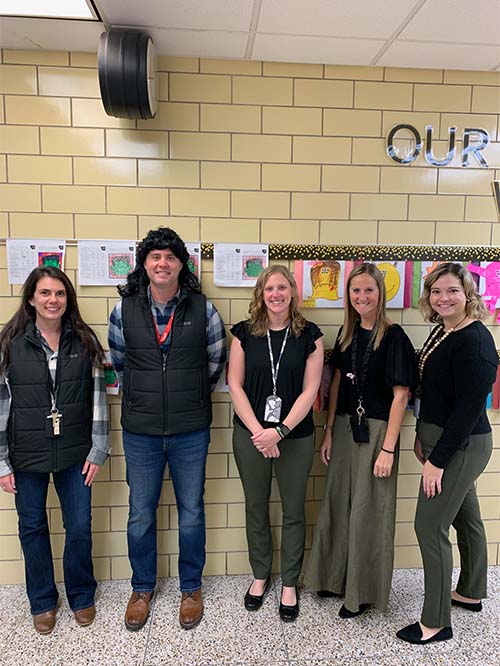 Staff members dressed up for twin day