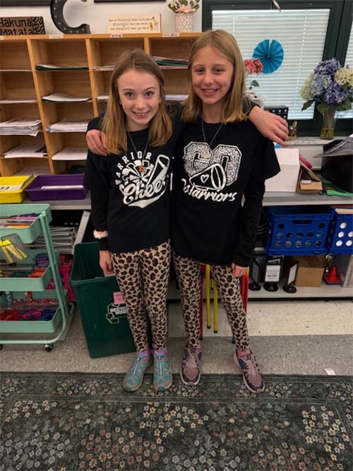 Two students dressed as cheetahs