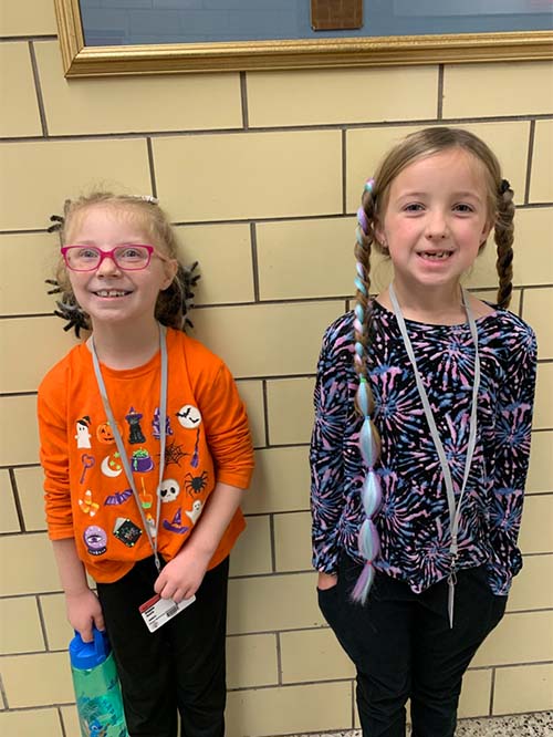 Two students with wacky hair