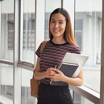 Female student smiling for the camera
