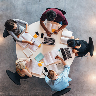 Group of parents meeting at a round table