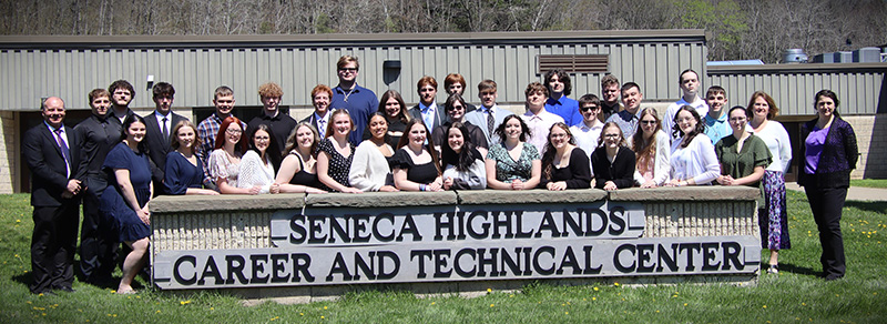 Group of students and staff celebrating the installation ceremony for the National Technical Honor Society