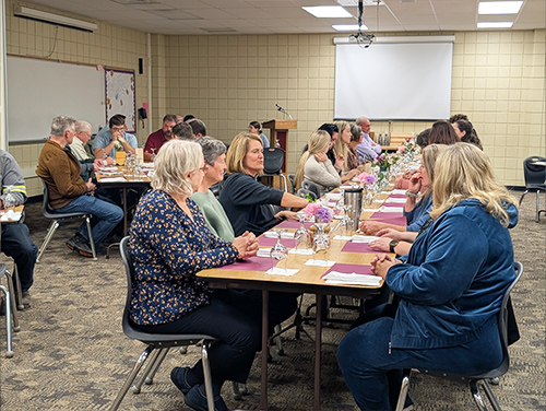 Dining room full of dinner guests