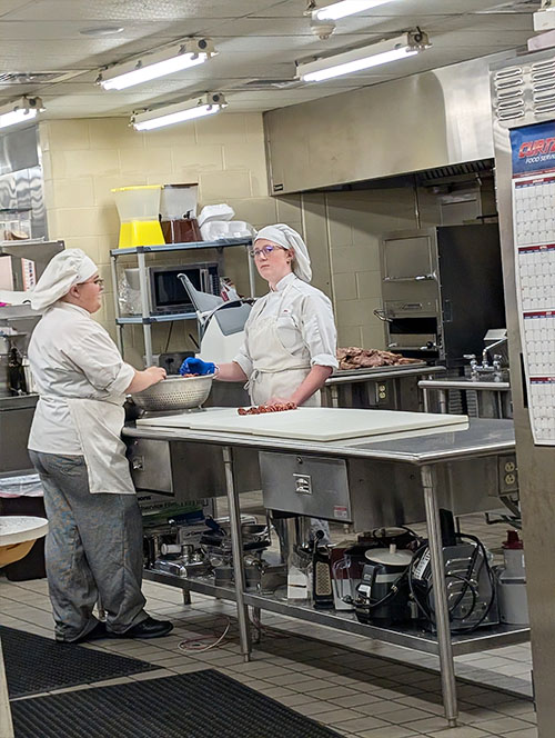 Two culinary students in the kitchen