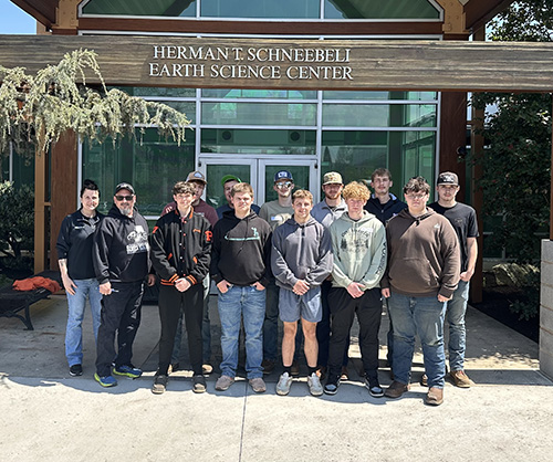Group of students visiting the Pennsylvania College of Technology Diesel Equipment Technology Facility