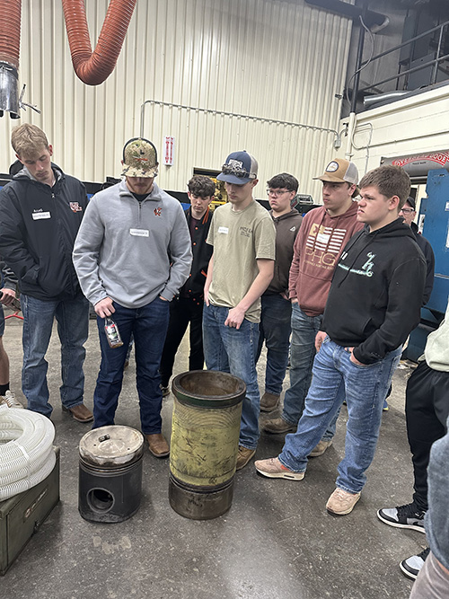 Group of students touring the Pennsylvania College of Technology Diesel Equipment Technology Facility