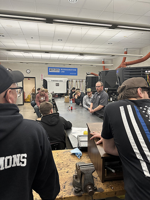 Students in a meeting room at Pennsylvania College of Technology Diesel Equipment Technology Facility